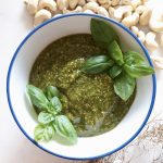 pesto in a bowl with cashews